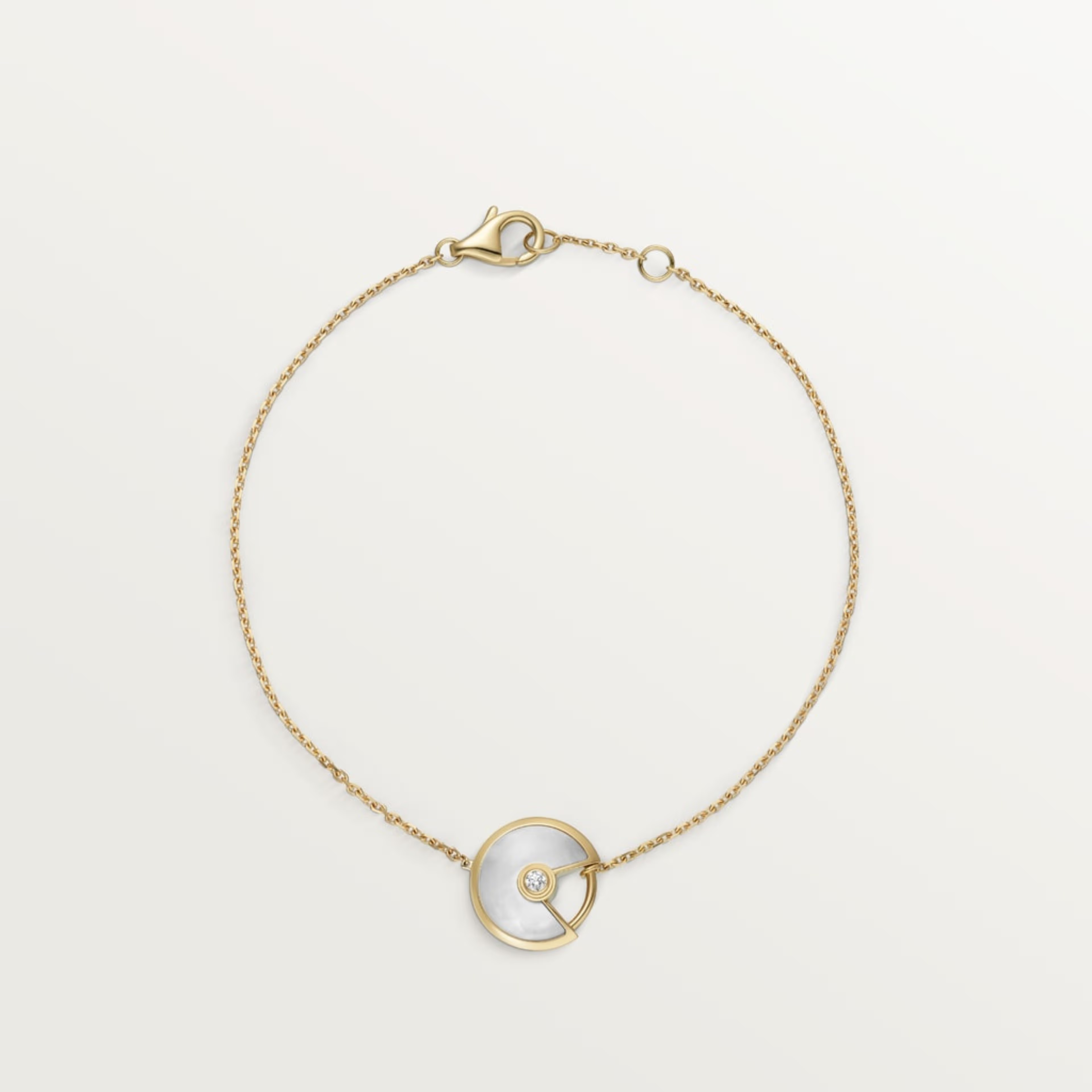 GOURMETTE CARTIER AMULETTE BLANC NACRE GOLD