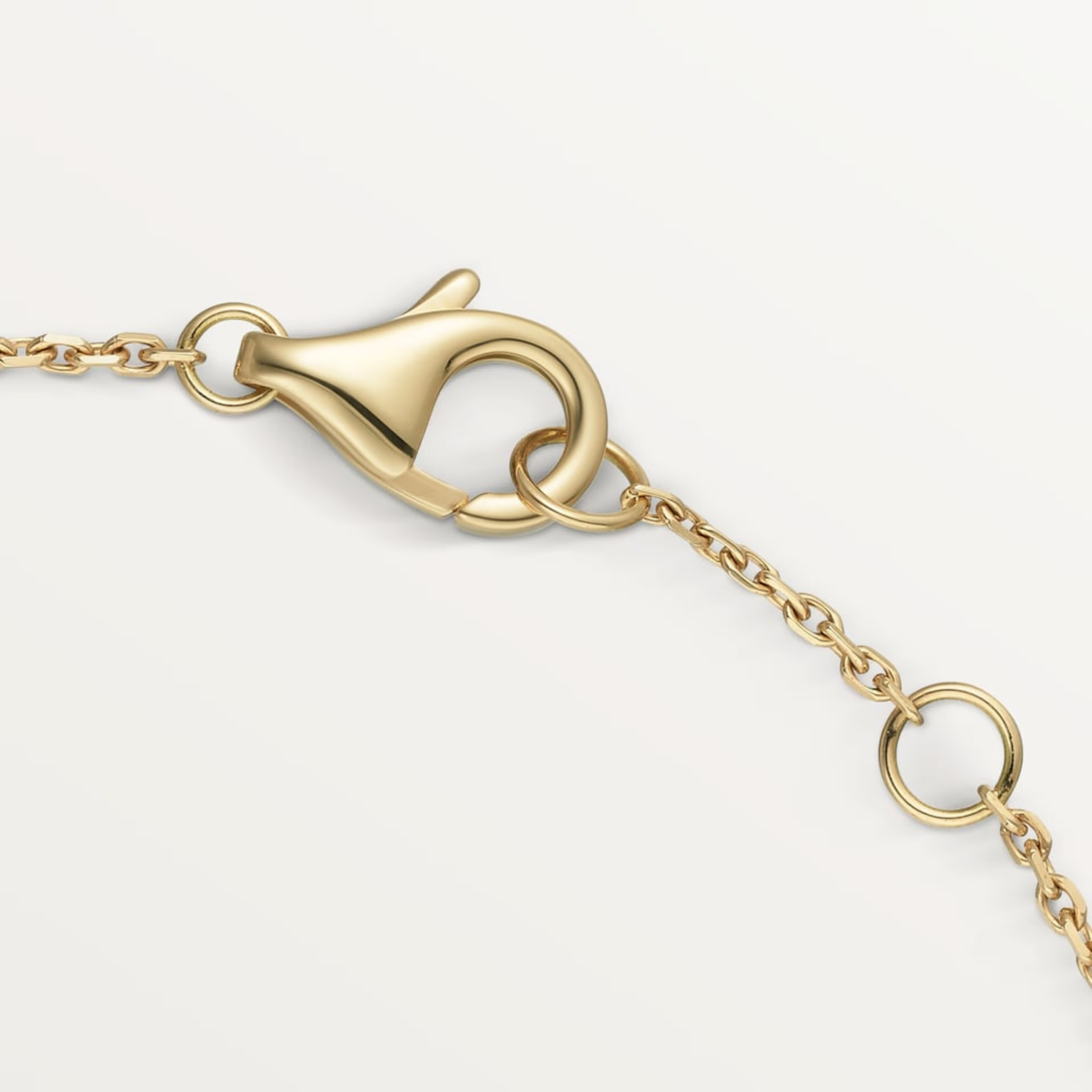 GOURMETTE CARTIER AMULETTE BLANC NACRE GOLD